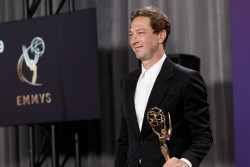 LOS ANGELES, CALIFORNIA - SEPTEMBER 15: Ebon Moss-Bachrach, winner of the Outstanding Supporting Actor in a Comedy Series for “The Bear”, poses in the press room during the 76th Primetime Emmy Awards at Peacock Theater on September 15, 2024 in Los Angeles, California.  (Photo by Frazer Harrison/Getty Images)