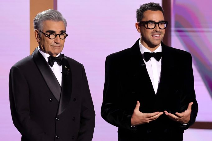 LOS ANGELES, CALIFORNIA - SEPTEMBER 15: (L-R) Hosts Eugene Levy and Dan Levy speak onstage during the 76th Primetime Emmy Awards at Peacock Theater on September 15, 2024 in Los Angeles, California.  (Photo by Kevin Winter/Getty Images)