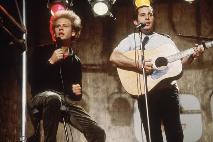 WEMBLEY, ENGLAND: Pop duo Simon and Garfunkel, comprising (L-R) singer, Art Garfunkel and singer-songwriter, Paul Simon, performing on ITV's 'Ready, Steady, Go!', July 8, 1966.   (Photo by Hulton Archive/Getty Images)