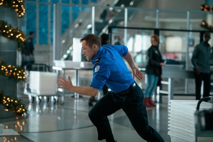 Carry-On. Taron Egerton as Ethan Kopek in Carry-On. Cr. Sam Lothridge/Netflix © 2024.