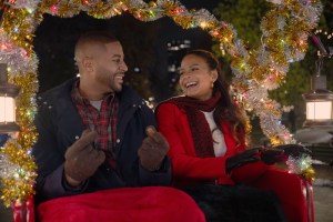 MEET ME NEXT CHRISTMAS, from left: Devale Ellis, Christina Milian, 2024. ph: Sophie Giraud/© Netflix / Courtesy Everett Collection