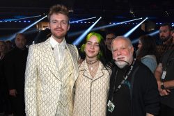 LOS ANGELES, CALIFORNIA - JANUARY 26: (L-R) Finneas O'Connell, Billie Eilish, and Grammy's producer Ken Ehrlich attend the 62nd Annual GRAMMY Awards at STAPLES Center on January 26, 2020 in Los Angeles, California. (Photo by Kevin Mazur/Getty Images for The Recording Academy)