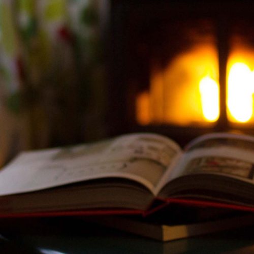 Reading and coffee near the fireplace