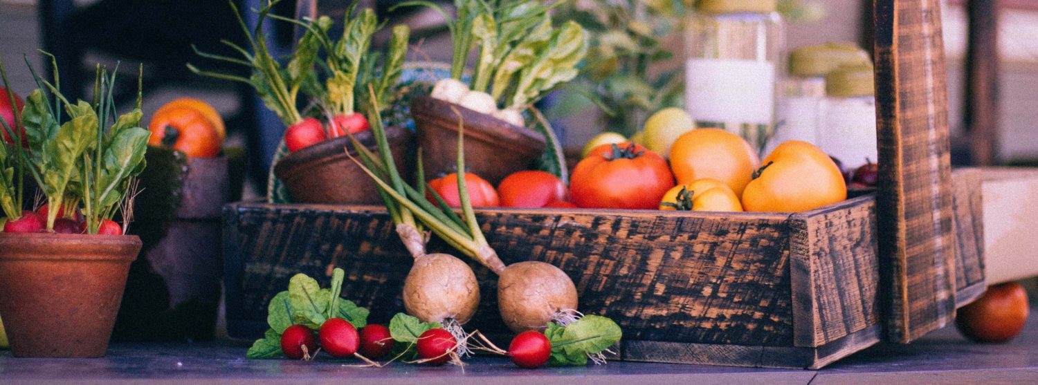 Veggies showcased in a basket of Delta's produce