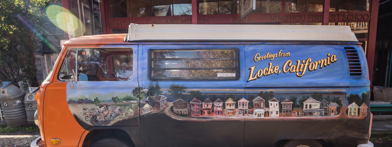 Painted van labeled with Greetings from Locke