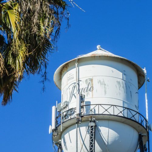 White Ryde Water Tower with Ryde labeled on it