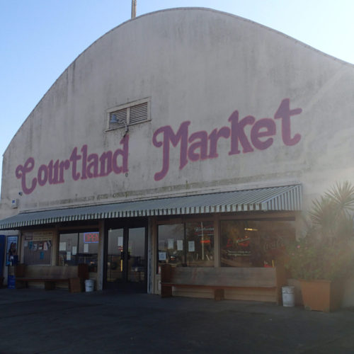 Storefront view of Courtland Market