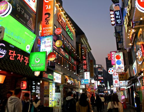 Small businesses on a busy street in Seoul