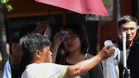 guinto3_TED ALJIBEAFP via Getty Images_heat wave