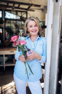 Picture of wendy standing in the door of the she shed