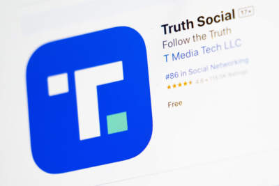 The download screen for Truth Social app is seen on a laptop computer, Wednesday, March 20, 2024, in New York. (AP Photo/John Minchillo)