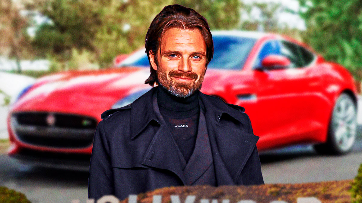 Sebastian Stan in front of a car from his collection.