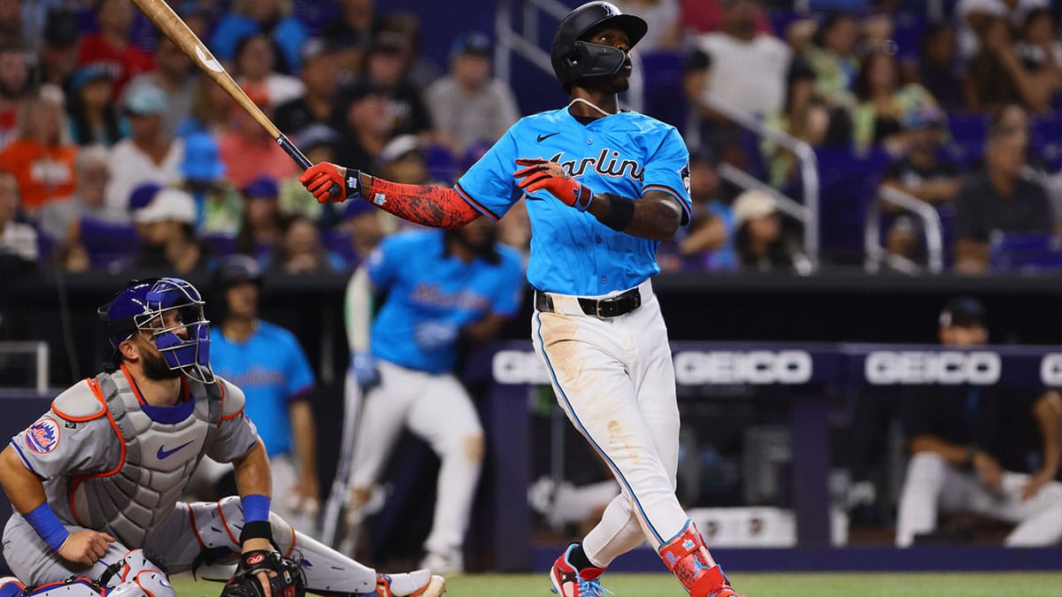 Miami Marlins designated hitter Jazz Chisholm Jr. (2) hits a three-run home run against the New York Mets during the fourth inning at loanDepot Park. 