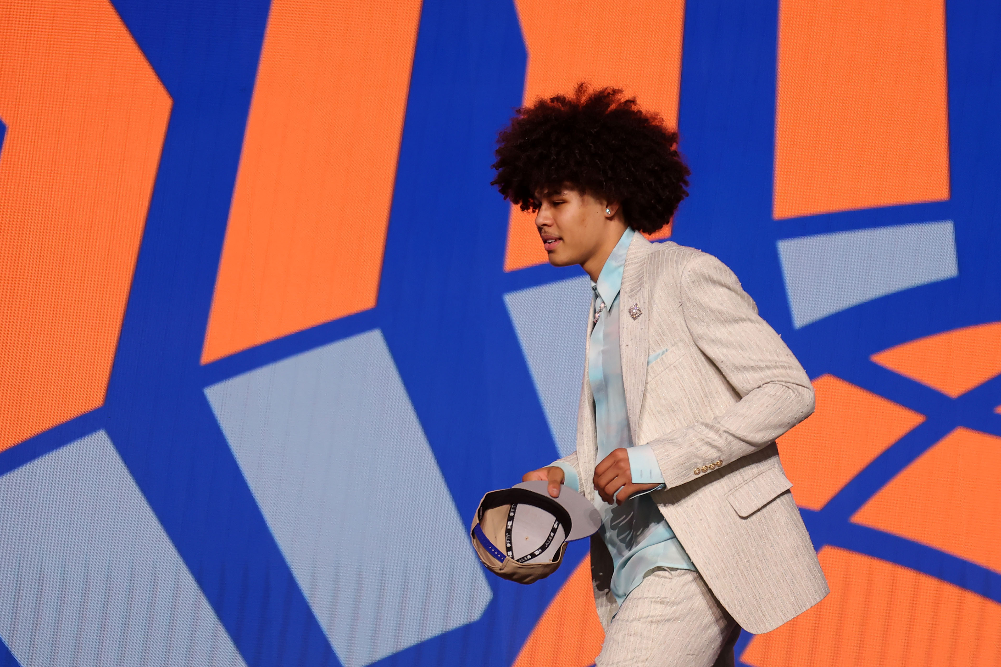 Kyshawn George walks on stage after being selected in the first round by the New York Knicks in the 2024 NBA Draft at Barclays Center. 