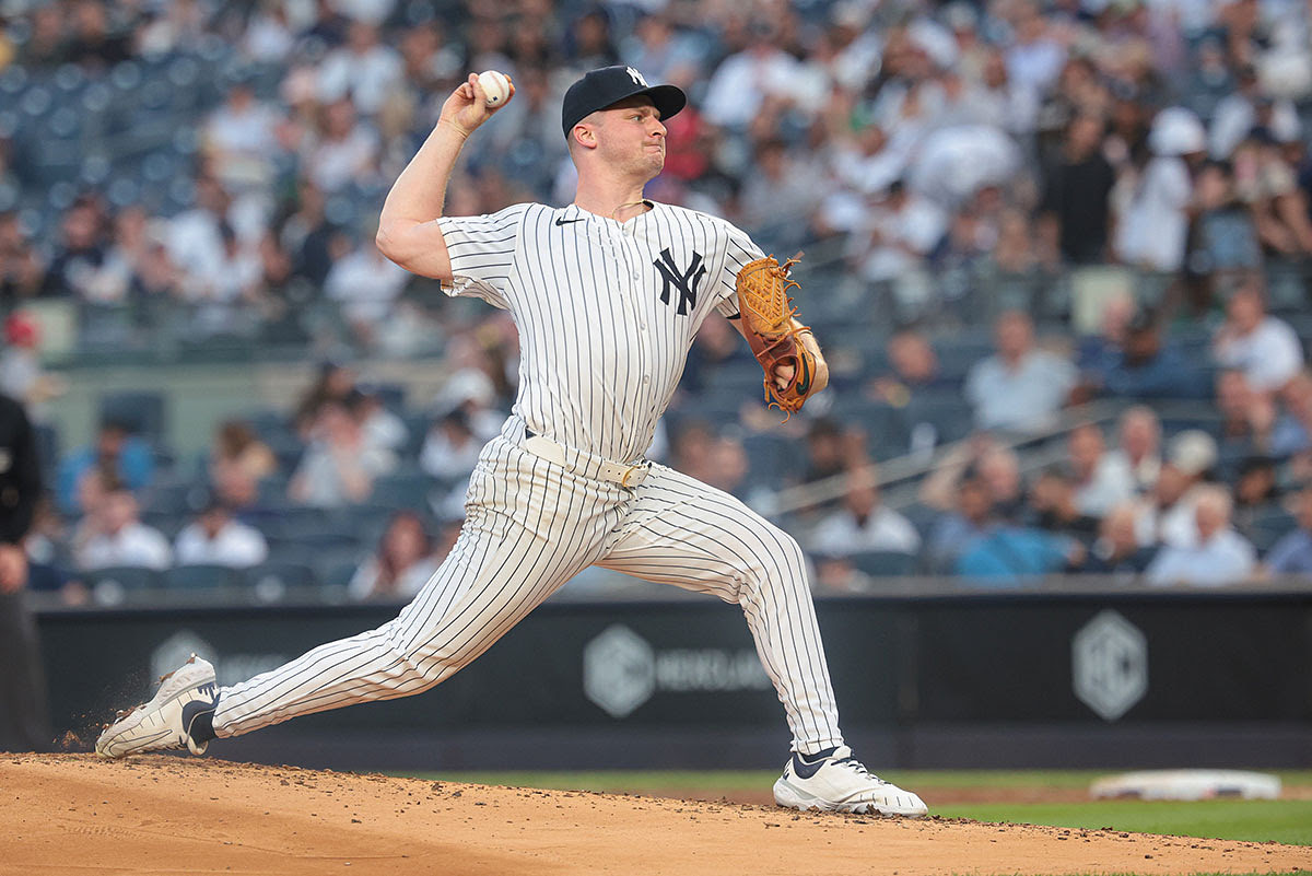 New York Yankees starting pitcher Clarke Schmidt (36) delivers a pitch during the third inning against the Seattle Mariners at Yankee Stadium.