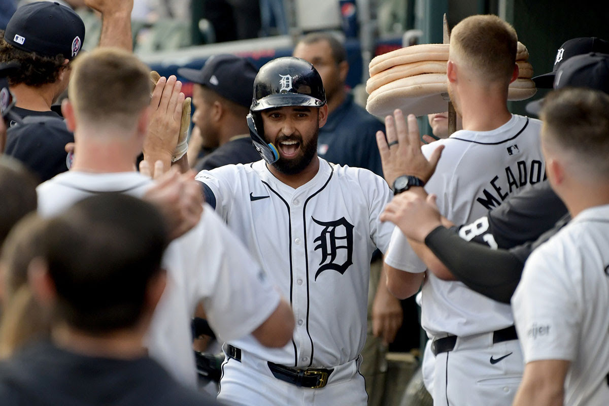 Detroit Tigers left fielder Riley Greene (31) celebrates in the dugout after hitting a solo home run against the Colorado Rockies in the first inning at Comerica Park.