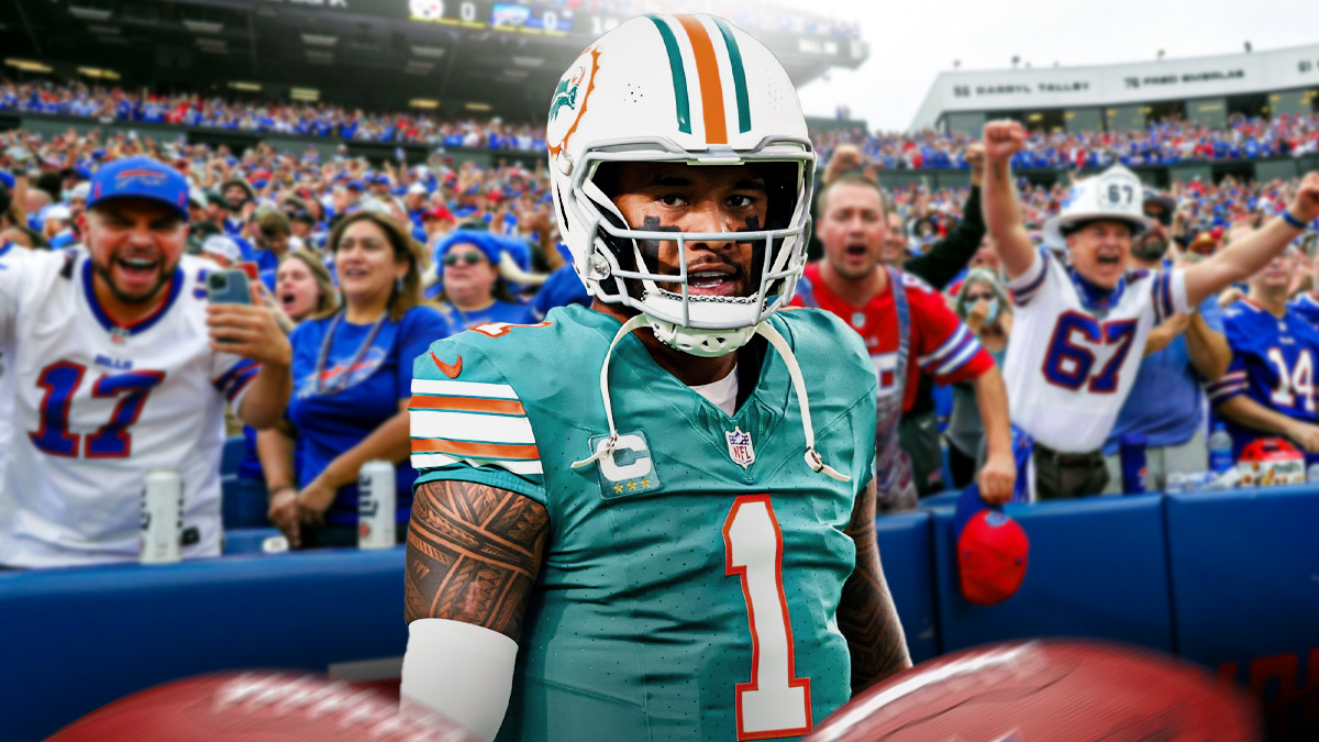 Photo: Tua Tagovailoa walking off field in Dolphins jersey, Bills fans in background