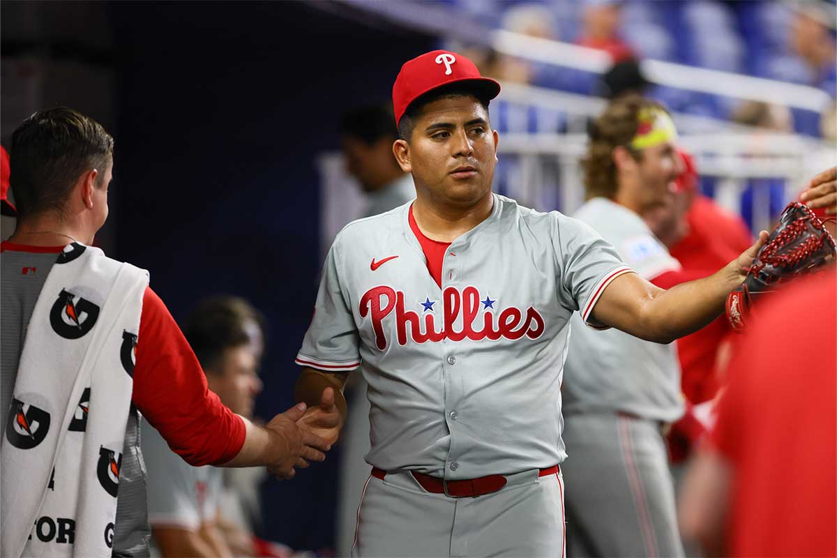 Philadelphia Phillies starting pitcher Ranger Suarez (55) celebrates with teammates against the Miami Marlins after the second inning at loanDepot Park. 