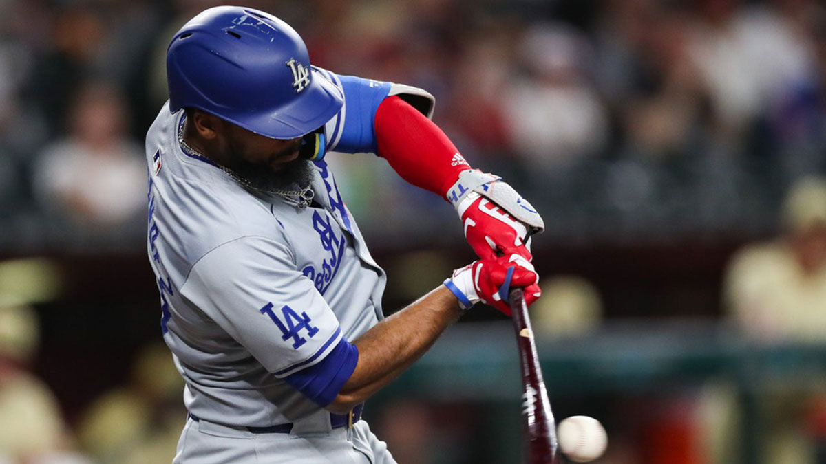 Los Angeles Dodgers outfielder Teoscar Hernandez (37) hits a ball on Aug. 30, 2024 at Chase Field in Phoenix.