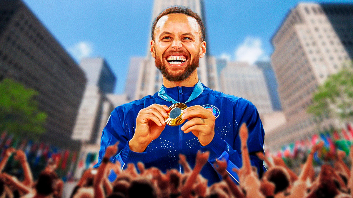 Olympic gold medalist, Warriors superstar Stephen Curry showing off his gold medal from the Olympics to a group of excited kids at Rockefeller Center in New York City