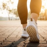 Article thumbnail: Runner feet running on road closeup on shoe.