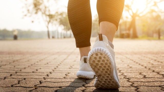 Article thumbnail: Runner feet running on road closeup on shoe.