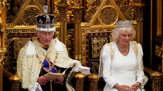 Article thumbnail: King Charles III looks up as he reads the King's Speech, as Queen Camilla sits beside him during the State Opening of Parliament in the House of Lords, London, Wednesday, July 17, 2024. King Charles III's speech will set out the agenda of the UK's first Labour government for 14 years. (AP Photo/Kirsty Wigglesworth, Pool)