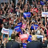 Article thumbnail: The crowd cheers as former US President and 2024 presidential nominee Donald Trump (R, bottom) with US Senator and vice presidential nominee J.D. Vance (L, bottom) attend their first campaign rally together at Van Andel Arena in Grand Rapids, Michigan, on July 20, 2024. (Photo by Jim WATSON / AFP) (Photo by JIM WATSON/AFP via Getty Images)