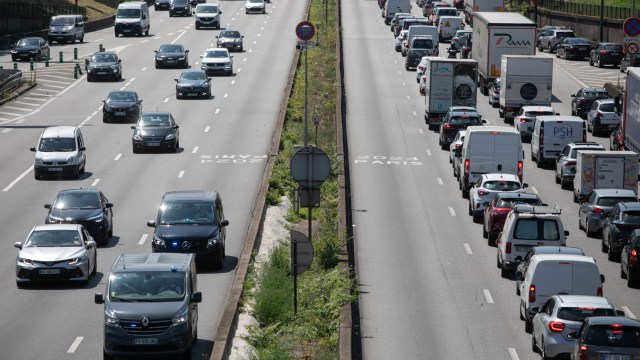 Police vehicles patrol the left lane of the ring road exclusive for the Olympic Games in Paris, France, on July 17, 2024. Since Monday July 15, lanes have been reserved for the traffic of vehicles accredited to transport athletes. (Photo by Victoria Valdivia / Hans Lucas / Hans Lucas via AFP) (Photo by VICTORIA VALDIVIA/Hans Lucas/AFP via Getty Images)