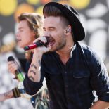 Article thumbnail: FILE - One Direction members, from right, Liam Payne and Harry Styles perform on ABC's "Good Morning America" at Rumsey Playfield/SummerStage on Tuesday, Aug. 4, 2015, in New York. (Photo by Charles Sykes/Invision/AP, File)