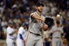 Apr 15, 2016; Los Angeles, CA, USA; San Francisco Giants starting pitcher Madison Bumgarner receives the ball on the mound during the fourth inning against the Los Angeles Dodgers at Dodger Stadium. Mandatory Credit: Kelvin Kuo-USA TODAY Sports