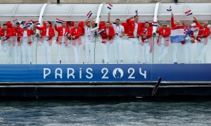 The delegation of Croatia aboard a boat in the floating parade on the river Seine