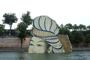 Reproductions of artworks from the Louvre Museum are installed on the Seine during the opening ceremony of the Olympic Games Paris 2024