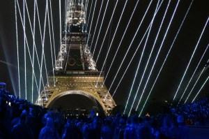 Lights illuminate the Eiffel Tower during the opening ceremony of the Paris 2024 Olympic Games in Paris.