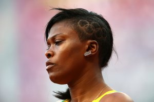 Nickiesha Wilson of Jamaica competes in the Women's 400m Hurdles Round 1 Heats on Day 9 of the London 2012 Olympic Games at the Olympic Stadium on August 5, 2012 in London, England.