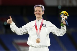 TOKYO, JAPAN - AUGUST 06: Megan Rapinoe of Team USA reacts after receiving the Bronze Medal after the Gold Medal Match Women's Football match between Canada and Sweden at International Stadium Yokohama on August 06, 2021 in Yokohama, Kanagawa, Japan. (Photo by Naomi Baker/Getty Images)