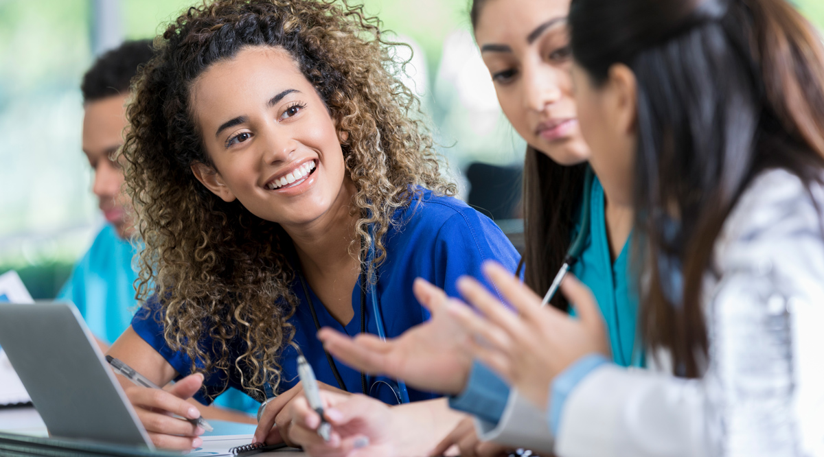 Medical students collaborating inside the classroom