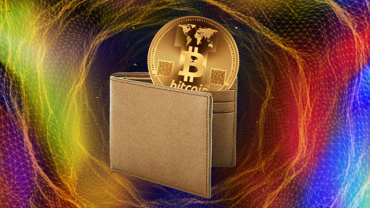 A large, gold bitcoin sticking out of a brown wallet in front of a multicolored background.