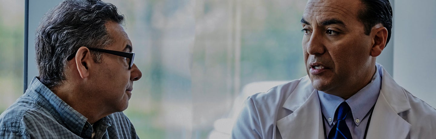 A doctor talking to a patient