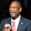 Hawks Legend Dikembe Mutombo is all smiles as he has his No. 55 jersey retired by the Hawks during half time in a basketball game against the Celtics on Tuesday, Nov. 24, 2015, in Atlanta.  Curtis Compton / ccompton@ajc.com