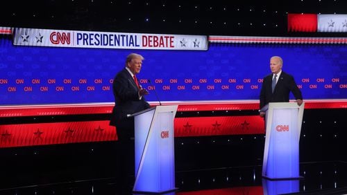 President Joe Biden, right, and former President Donald Trump face off at their presidential debate on June 27 at CNN in Atlanta. (Jason Getz/The Atlanta Journal-Constitution)