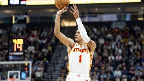 Atlanta Hawks forward Jalen Johnson (1) shoots during the first half of an NBA basketball game against the Utah Jazz, Friday, March 15, 2024, in Salt Lake City. (AP Photo/Spenser Heaps)