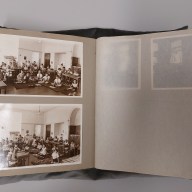 vintage photo album of Anne Frank that is an artifact at a replica of Anne Frank's hiding place