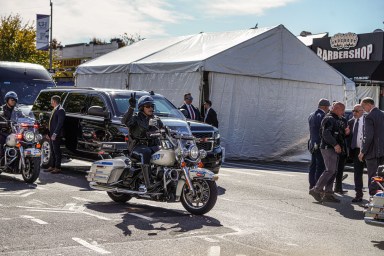 Donald Trump in tent outside Bronx barber shop