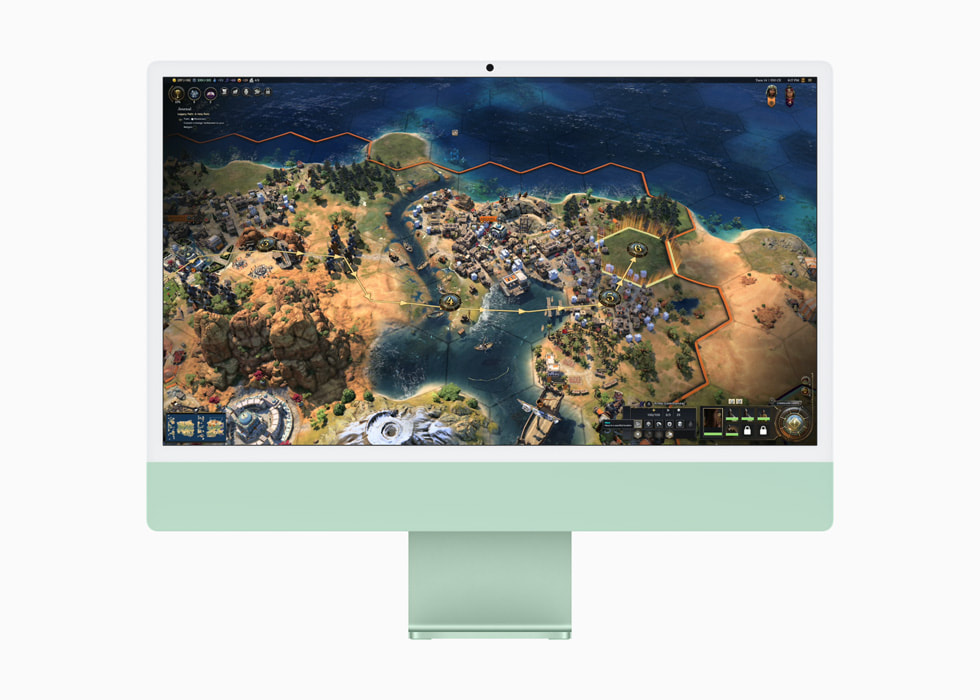 On a green iMac, a user plays Civilization VII.