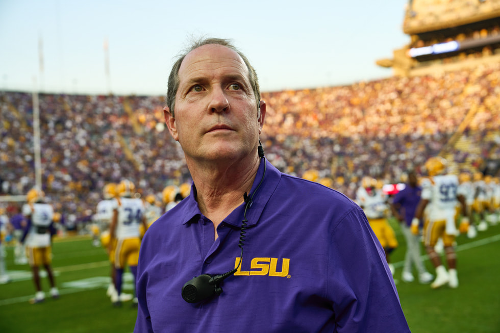 A portrait of Doug Aucoin on the sidelines at Tiger Stadium.