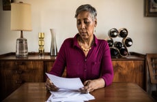 Woman reading paperwork