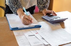 Woman calculating debt payments