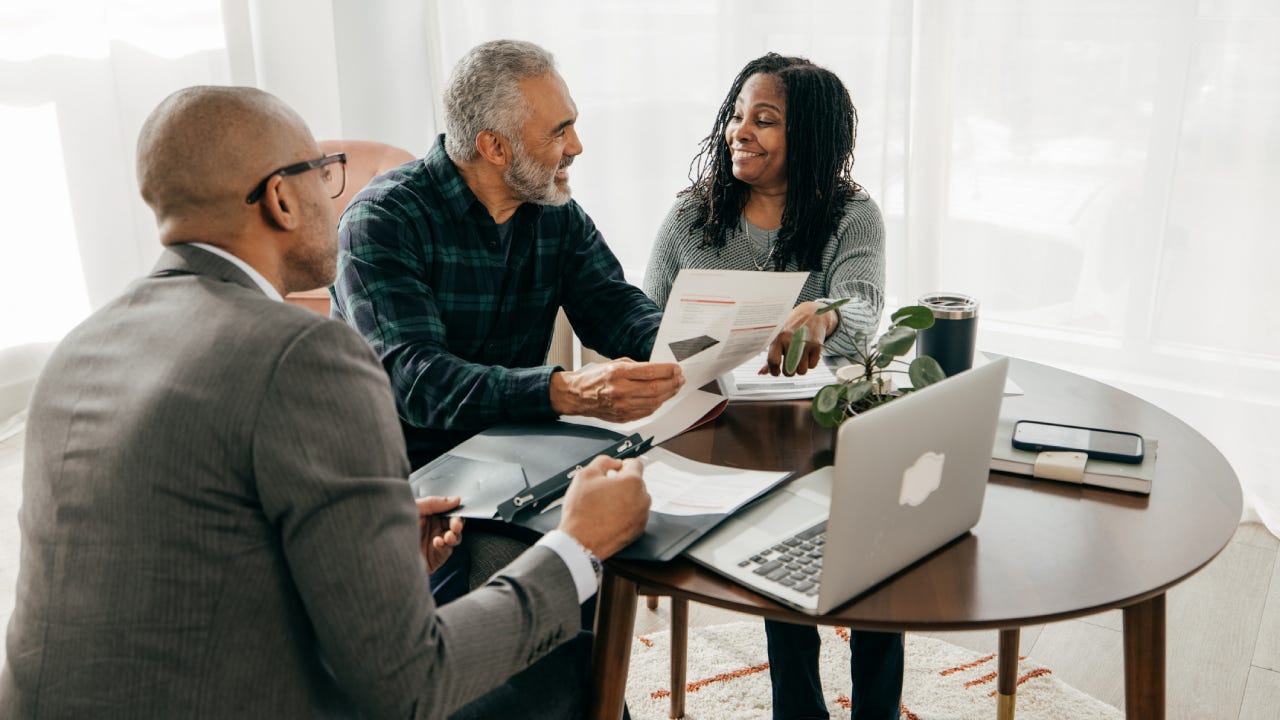 A couple meeting with a financial advisor