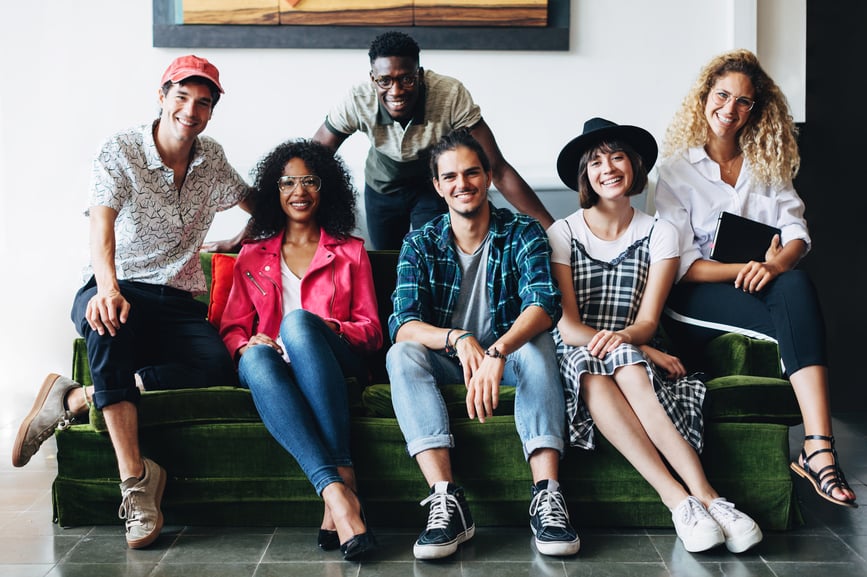 multi-ethnic-work-team-sitting-on-couch-human-capital